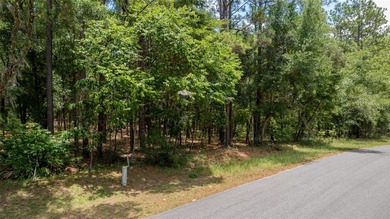 This 1.25 Acre wooded lot is located in a highly desired Rainbow on Juliette Falls Golf and Spa Club in Florida - for sale on GolfHomes.com, golf home, golf lot