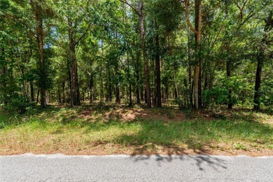 This 1.25 Acre wooded lot is located in a highly desired Rainbow on Juliette Falls Golf and Spa Club in Florida - for sale on GolfHomes.com, golf home, golf lot