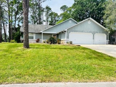 Golfers' paradise!! 
3 Car Garage, Golf Course Home! This on The Grand Club - Pine Lakes Course in Florida - for sale on GolfHomes.com, golf home, golf lot