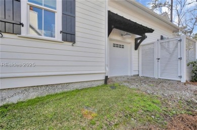 Lowcountry perfection nestled on this large homesite in on Oldfield Golf Club in South Carolina - for sale on GolfHomes.com, golf home, golf lot