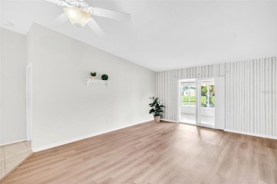 Welcome to this beautifully updated villa in Palm Harbor's on Highland Lakes Executive Golf Course in Florida - for sale on GolfHomes.com, golf home, golf lot