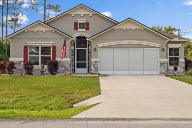 Welcome to 4 Eastmoor Ln, Palm Coast, FL 32164, an inviting and on The Grand Club Cypress Course in Florida - for sale on GolfHomes.com, golf home, golf lot