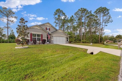 Welcome to 4 Eastmoor Ln, Palm Coast, FL 32164, an inviting and on The Grand Club Cypress Course in Florida - for sale on GolfHomes.com, golf home, golf lot