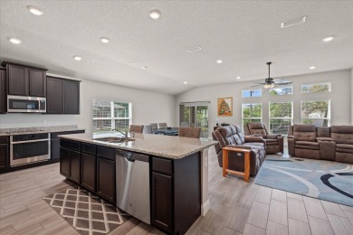Welcome to 4 Eastmoor Ln, Palm Coast, FL 32164, an inviting and on The Grand Club Cypress Course in Florida - for sale on GolfHomes.com, golf home, golf lot