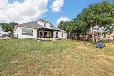 MAGNIFICENT WATERFRONT CUSTOM HOME SITUATED IN THE ESTEEMED on Sugar Tree Golf and Country Club in Texas - for sale on GolfHomes.com, golf home, golf lot