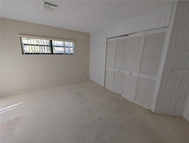 Under contract-accepting backup offers. HUGE PRICE REDUCTION on East Lake Woodlands Country Club in Florida - for sale on GolfHomes.com, golf home, golf lot