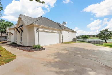 MAGNIFICENT WATERFRONT CUSTOM HOME SITUATED IN THE ESTEEMED on Sugar Tree Golf and Country Club in Texas - for sale on GolfHomes.com, golf home, golf lot