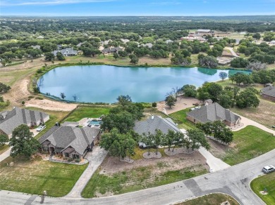 MAGNIFICENT WATERFRONT CUSTOM HOME SITUATED IN THE ESTEEMED on Sugar Tree Golf and Country Club in Texas - for sale on GolfHomes.com, golf home, golf lot