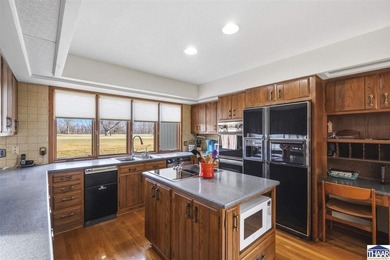 Homes on the 14th hole of the Country Club of Terre Haute Golf on Country Club of Terre Haute in Indiana - for sale on GolfHomes.com, golf home, golf lot