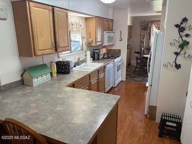 Very nice east facing mostly furnished home with newer dual pane on Tucson Estates Golf Course in Arizona - for sale on GolfHomes.com, golf home, golf lot