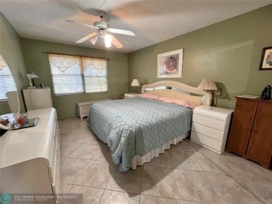 LOCATION! LOCATION!! DIRECTLY AROSS FROM THE CLUBHOUSE! COME AND on Hillsboro Pines Golf in Florida - for sale on GolfHomes.com, golf home, golf lot