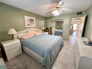 LOCATION! LOCATION!! DIRECTLY AROSS FROM THE CLUBHOUSE! COME AND on Hillsboro Pines Golf in Florida - for sale on GolfHomes.com, golf home, golf lot