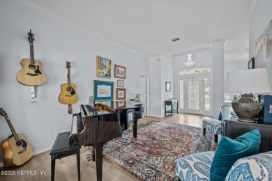 Discover your dream home in the exclusive Queens Harbour Yacht & on Queens Harbour Yacht and Country Club in Florida - for sale on GolfHomes.com, golf home, golf lot