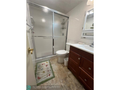 LOCATION! LOCATION!! DIRECTLY AROSS FROM THE CLUBHOUSE! COME AND on Hillsboro Pines Golf in Florida - for sale on GolfHomes.com, golf home, golf lot