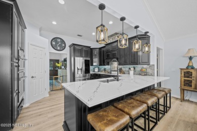 Discover your dream home in the exclusive Queens Harbour Yacht & on Queens Harbour Yacht and Country Club in Florida - for sale on GolfHomes.com, golf home, golf lot