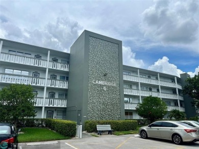 LOCATION! LOCATION!! DIRECTLY AROSS FROM THE CLUBHOUSE! COME AND on Hillsboro Pines Golf in Florida - for sale on GolfHomes.com, golf home, golf lot