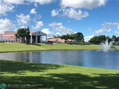 LOCATION! LOCATION!! DIRECTLY AROSS FROM THE CLUBHOUSE! COME AND on Hillsboro Pines Golf in Florida - for sale on GolfHomes.com, golf home, golf lot