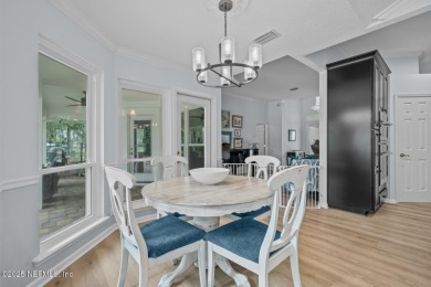 Discover your dream home in the exclusive Queens Harbour Yacht & on Queens Harbour Yacht and Country Club in Florida - for sale on GolfHomes.com, golf home, golf lot