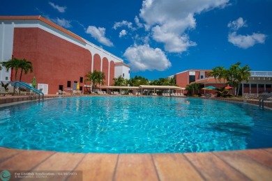 LOCATION! LOCATION!! DIRECTLY AROSS FROM THE CLUBHOUSE! COME AND on Hillsboro Pines Golf in Florida - for sale on GolfHomes.com, golf home, golf lot