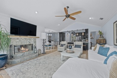 Discover your dream home in the exclusive Queens Harbour Yacht & on Queens Harbour Yacht and Country Club in Florida - for sale on GolfHomes.com, golf home, golf lot