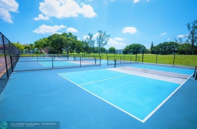 LOCATION! LOCATION!! DIRECTLY AROSS FROM THE CLUBHOUSE! COME AND on Hillsboro Pines Golf in Florida - for sale on GolfHomes.com, golf home, golf lot