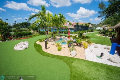 LOCATION! LOCATION!! DIRECTLY AROSS FROM THE CLUBHOUSE! COME AND on Hillsboro Pines Golf in Florida - for sale on GolfHomes.com, golf home, golf lot
