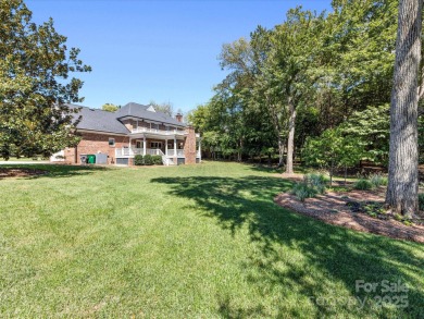 Stunning updated 2 story brick home located in the highly on Carmel Country Club in North Carolina - for sale on GolfHomes.com, golf home, golf lot