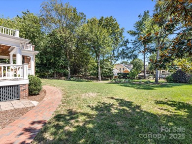 Stunning updated 2 story brick home located in the highly on Carmel Country Club in North Carolina - for sale on GolfHomes.com, golf home, golf lot