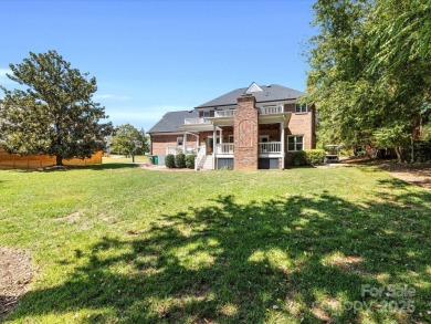 Stunning updated 2 story brick home located in the highly on Carmel Country Club in North Carolina - for sale on GolfHomes.com, golf home, golf lot