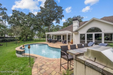 Discover your dream home in the exclusive Queens Harbour Yacht & on Queens Harbour Yacht and Country Club in Florida - for sale on GolfHomes.com, golf home, golf lot