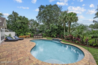 Discover your dream home in the exclusive Queens Harbour Yacht & on Queens Harbour Yacht and Country Club in Florida - for sale on GolfHomes.com, golf home, golf lot