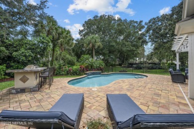 Discover your dream home in the exclusive Queens Harbour Yacht & on Queens Harbour Yacht and Country Club in Florida - for sale on GolfHomes.com, golf home, golf lot