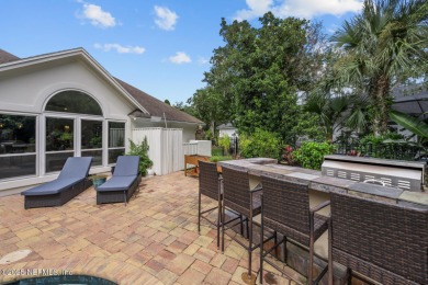 Discover your dream home in the exclusive Queens Harbour Yacht & on Queens Harbour Yacht and Country Club in Florida - for sale on GolfHomes.com, golf home, golf lot