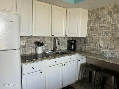 INVESTMENT OPPORTUNITY HANDICAP ACCESSIBLE! Enjoy your fully on Oceans Golf Club in Florida - for sale on GolfHomes.com, golf home, golf lot
