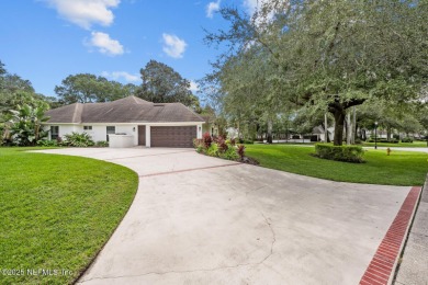 Discover your dream home in the exclusive Queens Harbour Yacht & on Queens Harbour Yacht and Country Club in Florida - for sale on GolfHomes.com, golf home, golf lot