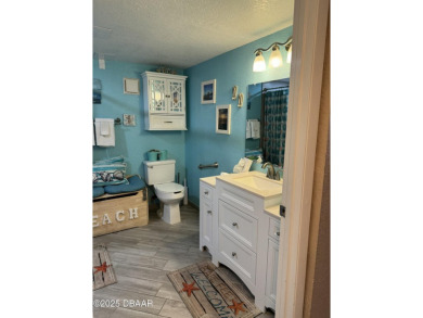 INVESTMENT OPPORTUNITY HANDICAP ACCESSIBLE! Enjoy your fully on Oceans Golf Club in Florida - for sale on GolfHomes.com, golf home, golf lot