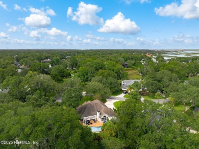 Discover your dream home in the exclusive Queens Harbour Yacht & on Queens Harbour Yacht and Country Club in Florida - for sale on GolfHomes.com, golf home, golf lot