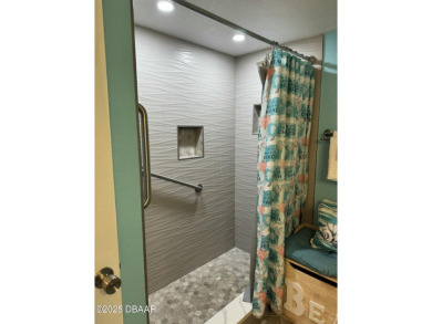 INVESTMENT OPPORTUNITY HANDICAP ACCESSIBLE! Enjoy your fully on Oceans Golf Club in Florida - for sale on GolfHomes.com, golf home, golf lot