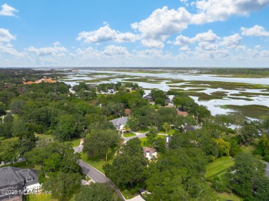 Discover your dream home in the exclusive Queens Harbour Yacht & on Queens Harbour Yacht and Country Club in Florida - for sale on GolfHomes.com, golf home, golf lot