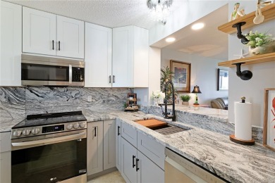 Prepare to be impressed!  Stunning renovated 4th floor condo on Pinebrook/Ironwood Golf Course in Florida - for sale on GolfHomes.com, golf home, golf lot