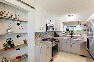 Prepare to be impressed!  Stunning renovated 4th floor condo on Pinebrook/Ironwood Golf Course in Florida - for sale on GolfHomes.com, golf home, golf lot