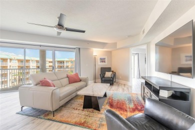 Resort Style Living Everyday in this immaculately remodeled on Harbour Village Golf and Yacht Club in Florida - for sale on GolfHomes.com, golf home, golf lot