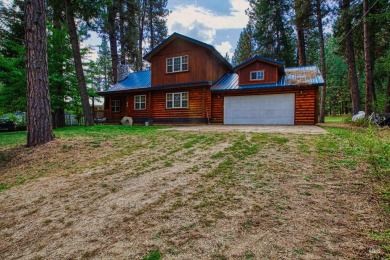Charming and beautiful log home perfectly located on the 18th on Terrace Lakes Golf Resort in Idaho - for sale on GolfHomes.com, golf home, golf lot