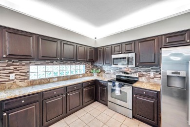 Welcome to this executive style 4 Bedroom, 3 Bath, 3 Car Garage on Crescent Oaks Country Club in Florida - for sale on GolfHomes.com, golf home, golf lot