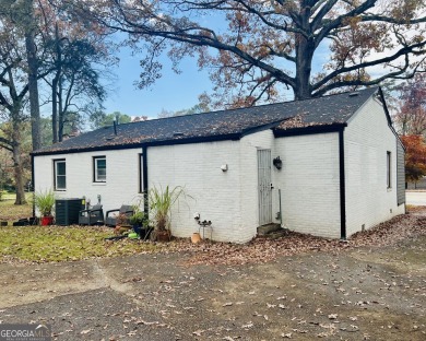 Located in the sought after East Lake neighborhood.  Across the on East Lake Golf Club in Georgia - for sale on GolfHomes.com, golf home, golf lot