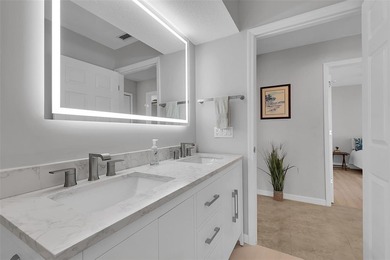 Beautifully remodeled pool home with stunning lake and golf on Burnt Store Golf Club in Florida - for sale on GolfHomes.com, golf home, golf lot