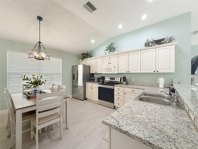 **MOVE IN READY** CUSTOM DESIGNED HOME with $64,000 in UPGRADES on Nancy Lopez Legacy Golf and Country Club in Florida - for sale on GolfHomes.com, golf home, golf lot