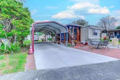 Fully Furnished 3BD 2BA manufactured home situated on one of the on Barefoot Resort and Golf Club  in South Carolina - for sale on GolfHomes.com, golf home, golf lot