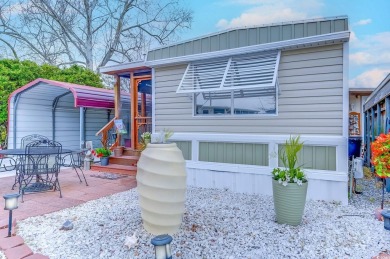 Fully Furnished 3BD 2BA manufactured home situated on one of the on Barefoot Resort and Golf Club  in South Carolina - for sale on GolfHomes.com, golf home, golf lot