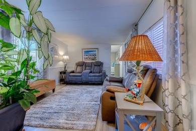 Fully Furnished 3BD 2BA manufactured home situated on one of the on Barefoot Resort and Golf Club  in South Carolina - for sale on GolfHomes.com, golf home, golf lot